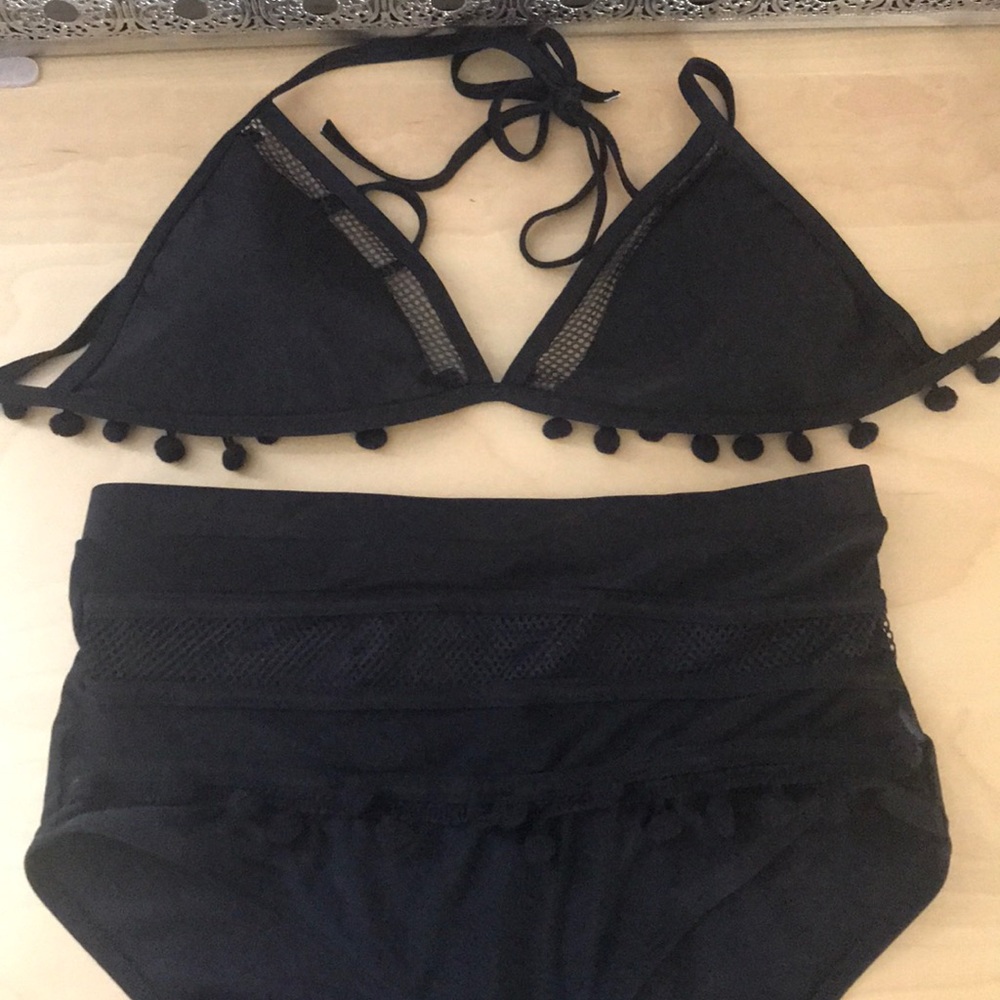 2 piece bikini. High rise bottoms, triangle top.